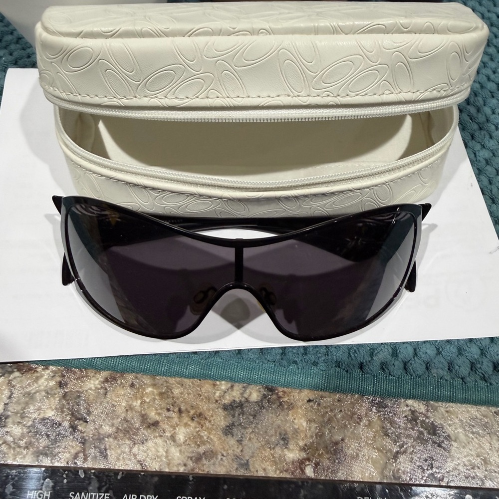 Oakley Black Sunglasses with Cream Case